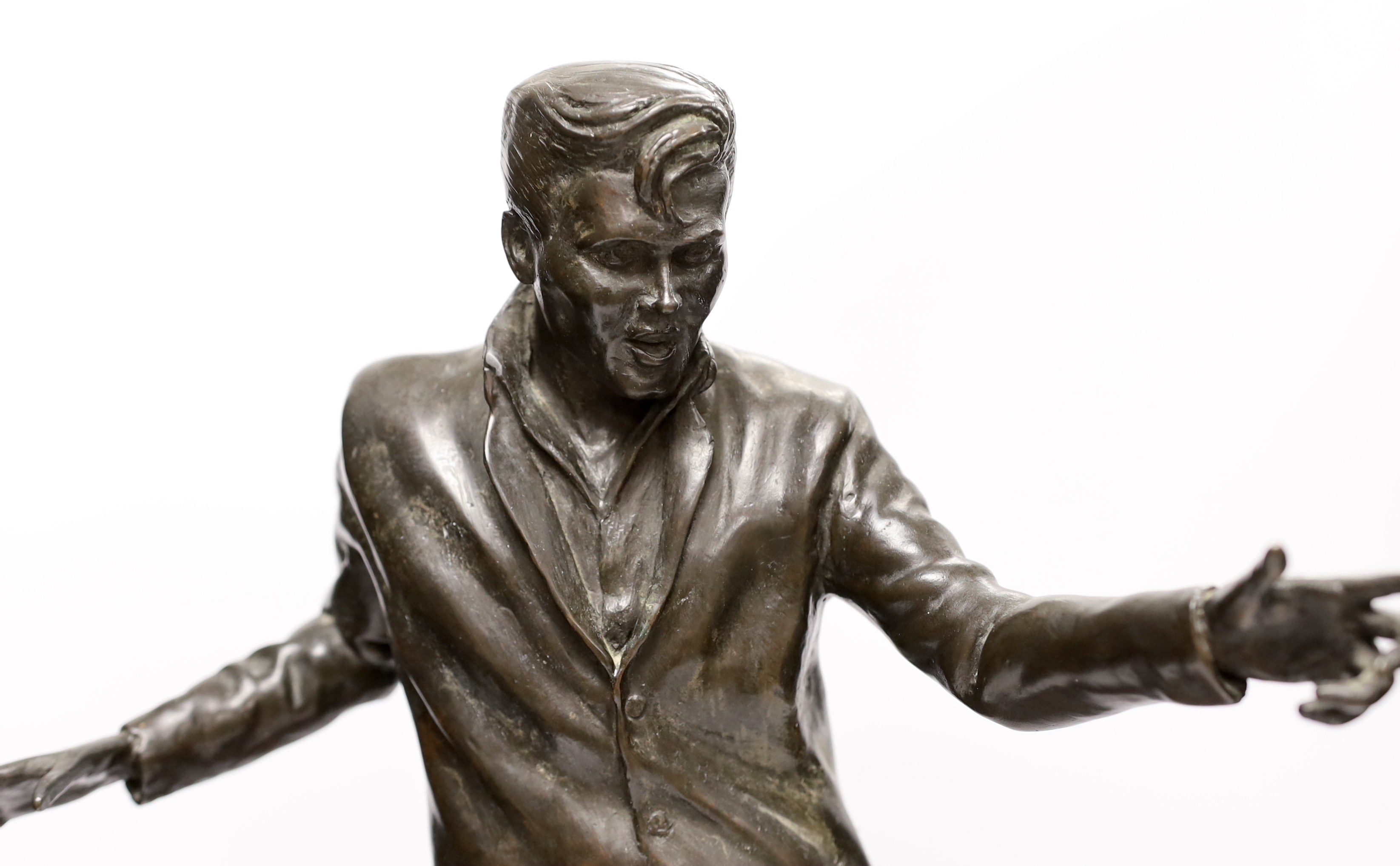 A bronze statue of Billy Fury, one of five cast by Tom Murphy, based on the public statue at the Albert Dock, Liverpool, together with a limited edition plaque, produced and sold to raise money to fund the installation o